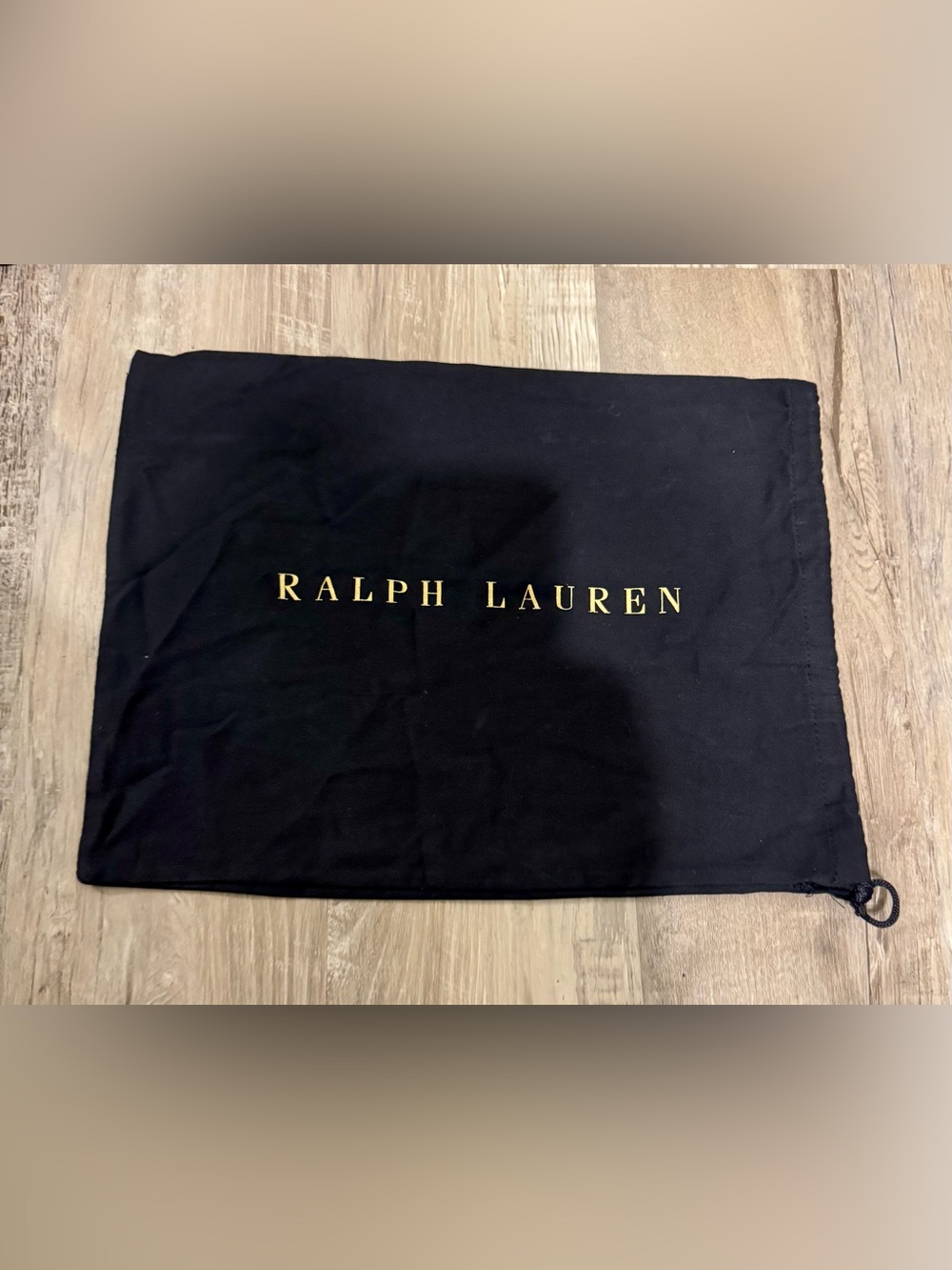 RALPH LAUREN . Authentic dust bag. Features the RALPH LAUREN logo in gold lette